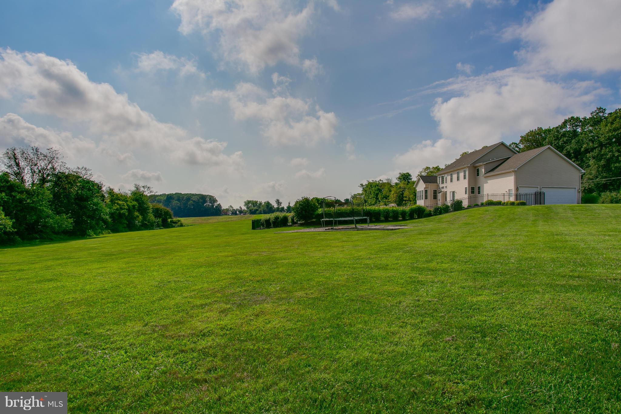 4628 Dave Rill Road Hampstead, MD 21074 - Photo 30 of 30 a view of a big yard with plants and large trees
