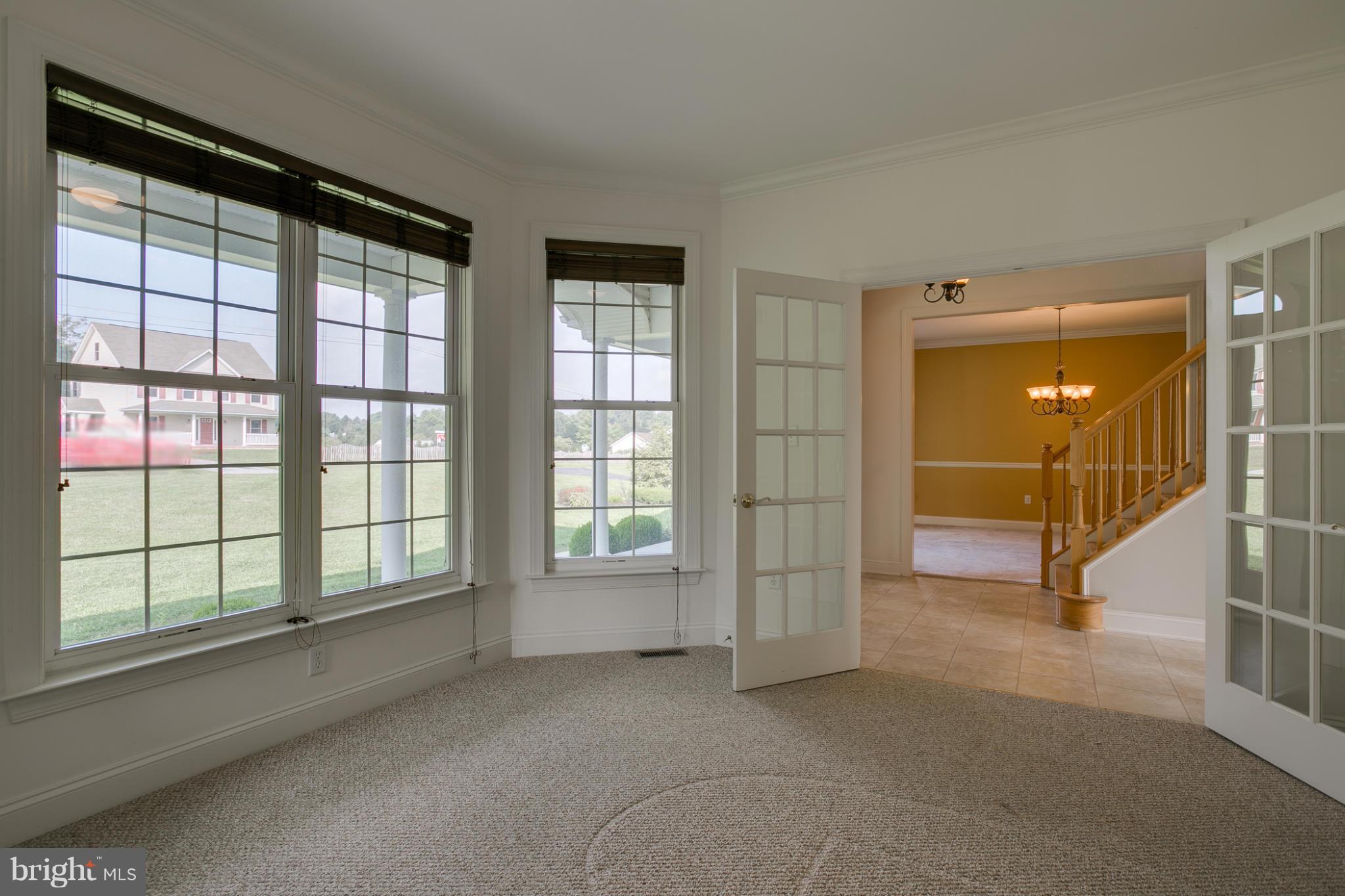 4628 Dave Rill Road Hampstead, MD 21074 - Photo 4 of 30 a view of an empty room with a window
