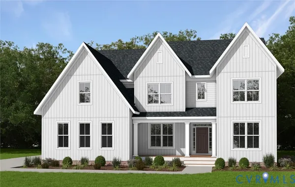 a view of a white house with yard and windows