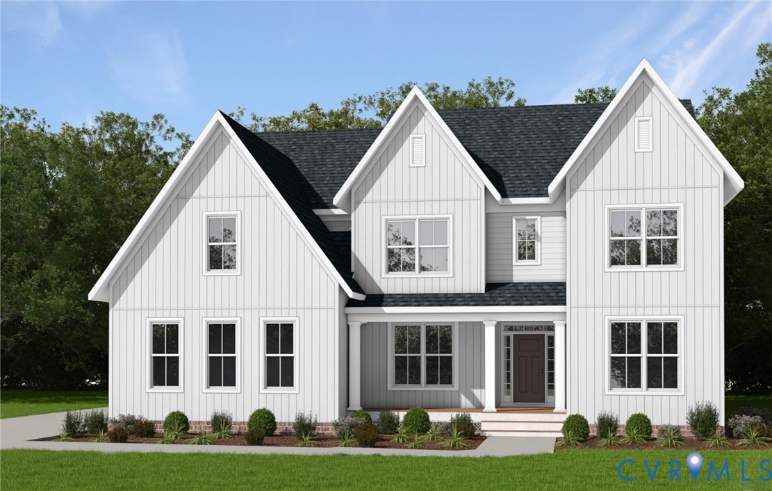 3924 Robins Ridge Drive Moseley, VA 23120 - Photo 1 of 8 a view of a white house with yard and windows