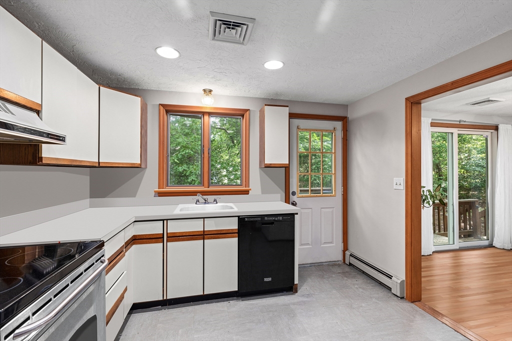 34 Diandy Road Bourne, MA 02562 - Photo 13 of 20 a kitchen that has a sink and a stove