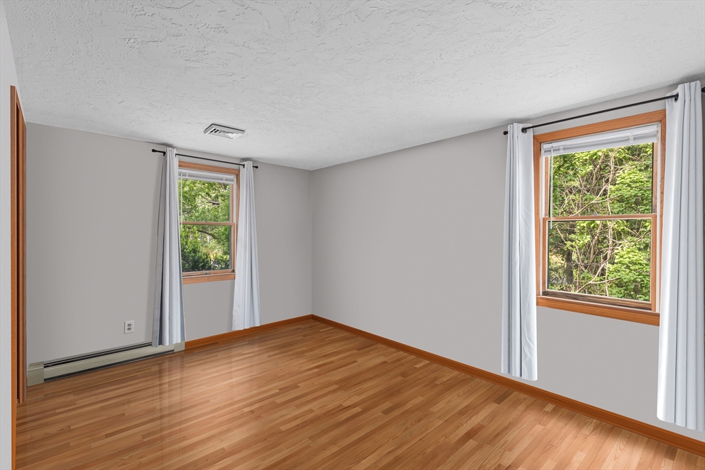 34 Diandy Road Bourne, MA 02562 - Photo 18 of 20 a view of empty room with wooden floor and fan