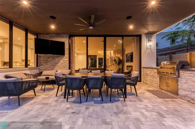 a view of a big dining room with furniture window and outside view