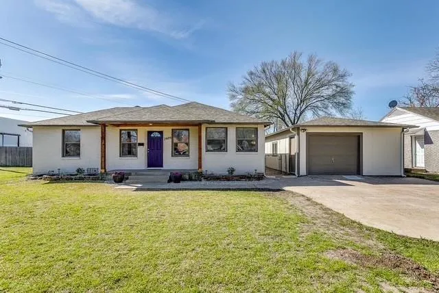 a view of a house with swimming pool and a yard