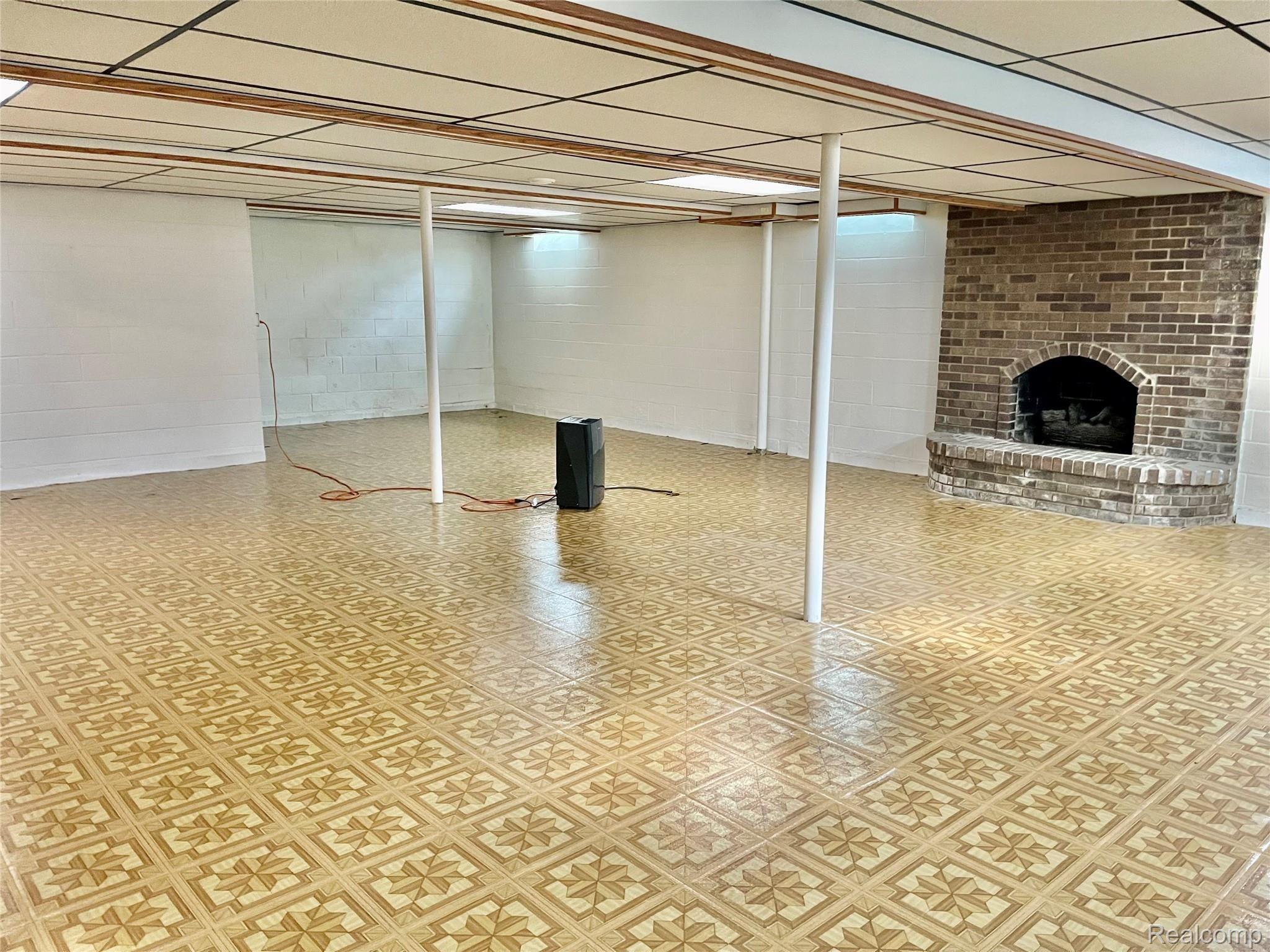 37481 Ryan Road Sterling Heights, MI 48310 - Photo 40 of 47 Basement fireplace.jpg