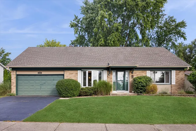 a house view with a garden space