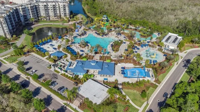 an aerial view of residential house with parking space
