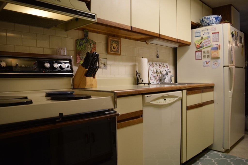 140 Swanson Road, Unit 413 Boxborough, MA 01719 - Photo 11 of 26 a room with storage and utility