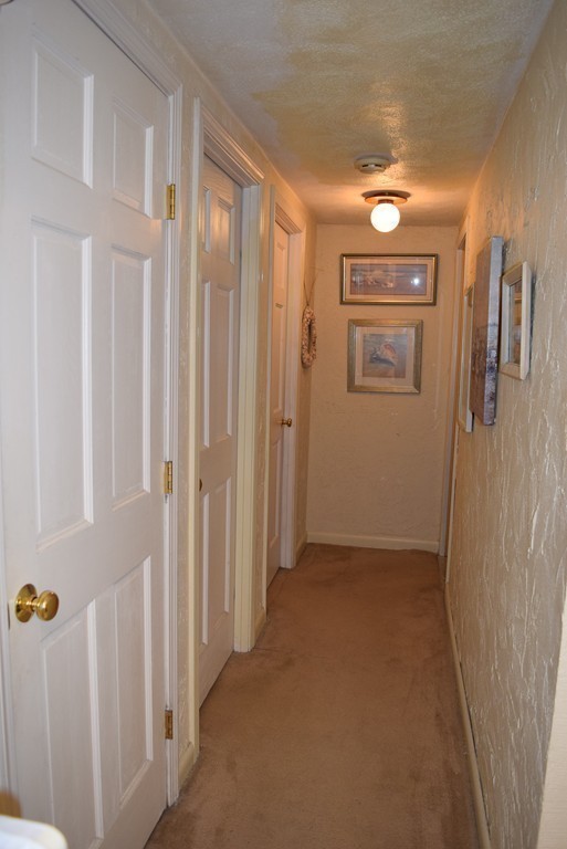 140 Swanson Road, Unit 413 Boxborough, MA 01719 - Photo 13 of 26 a view of hallway