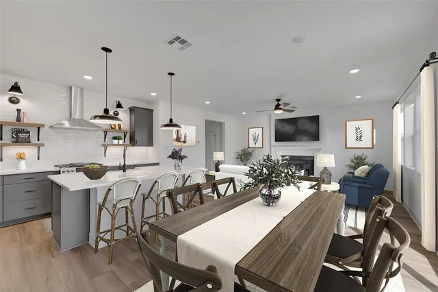 a view of a dining room with furniture