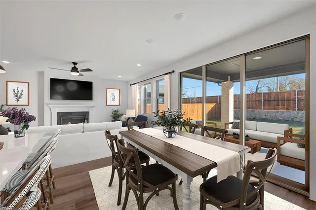 a view of a dining room with furniture and window