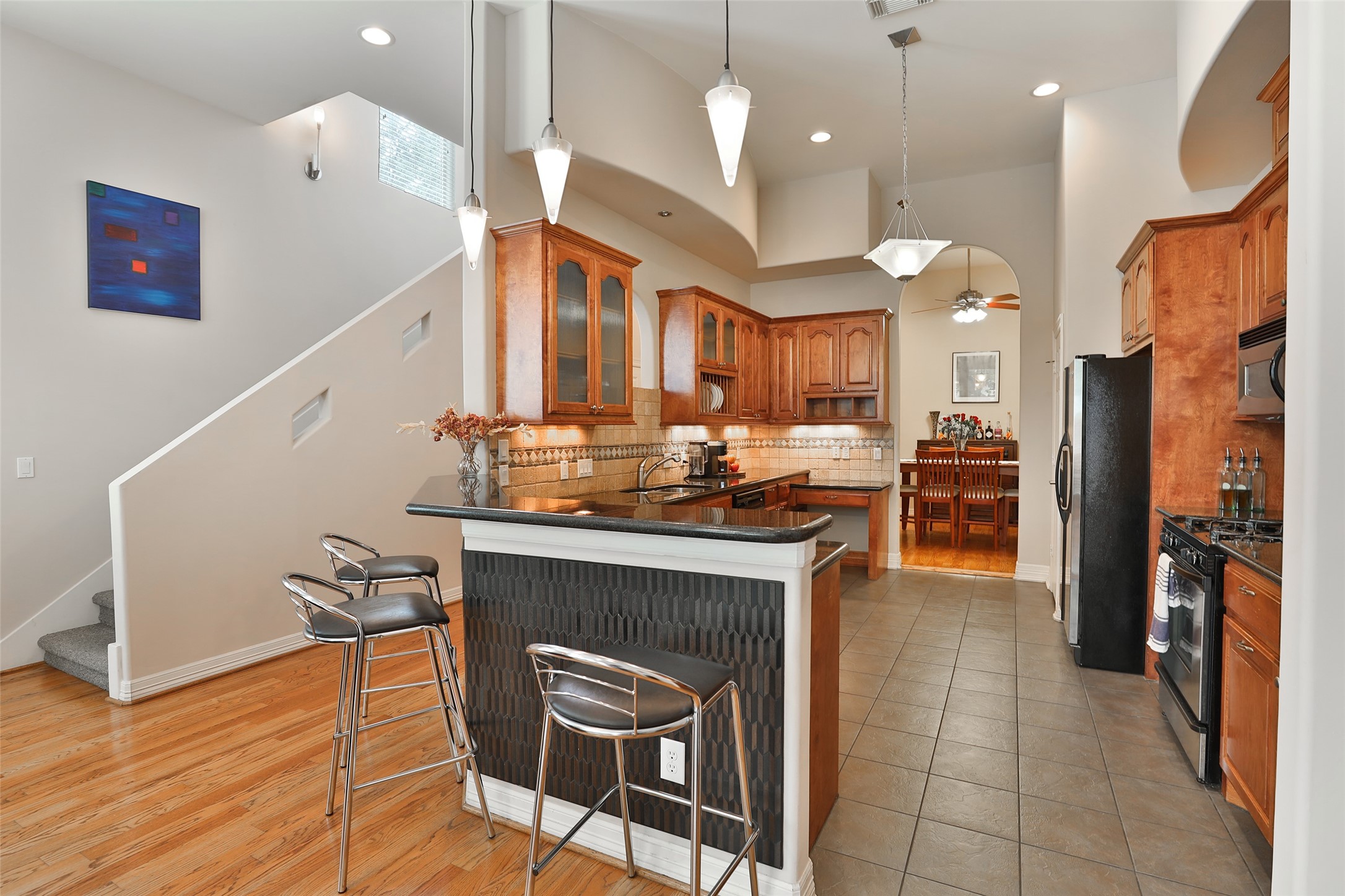 826 East 29th Street Houston, TX 77009 - Photo 7 of 32 The kitchen is open to the den.