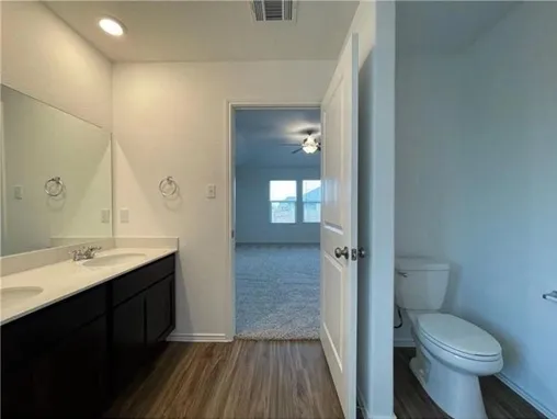 a view of a big room with carpet