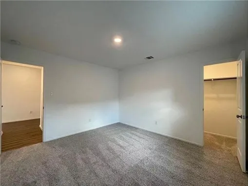 a bathroom with a double vanity sink and mirror
