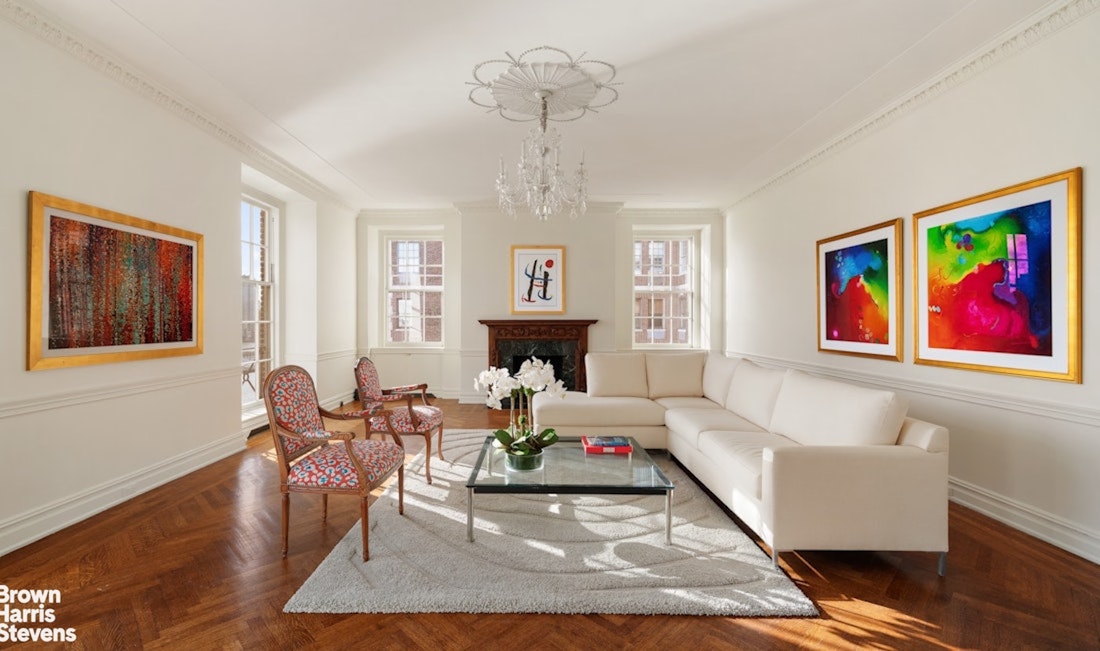 1 Sutton Place South, Unit 11C Manhattan, NY 10022 - Photo 5 of 20 a living room with furniture fireplace and window