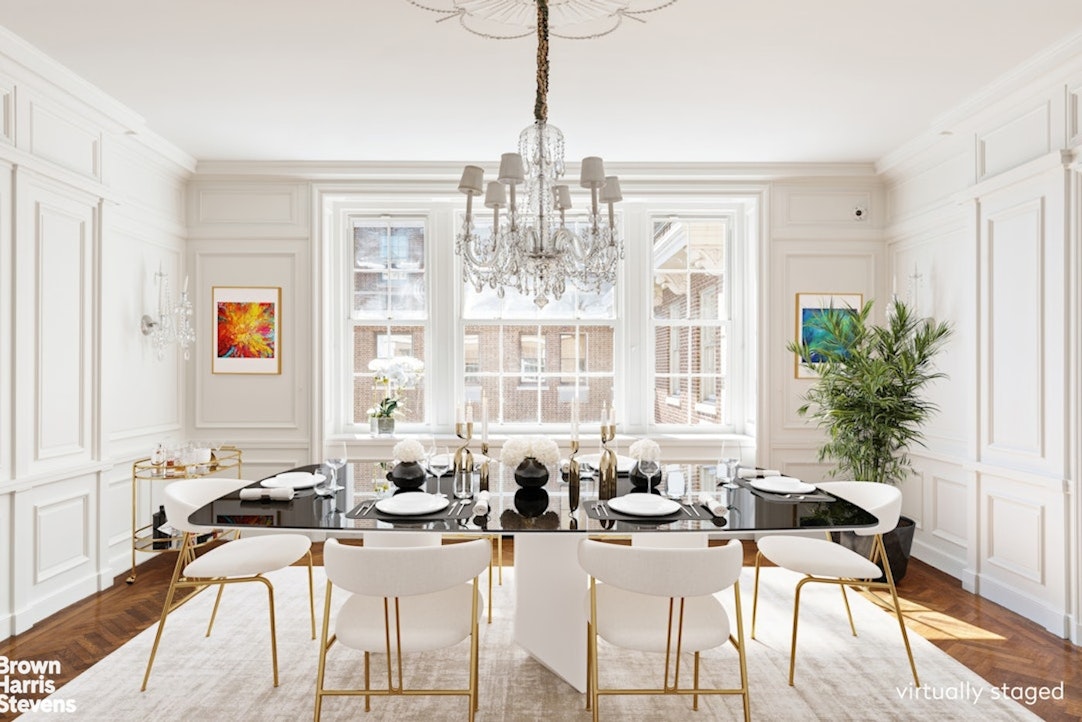 1 Sutton Place South, Unit 11C Manhattan, NY 10022 - Photo 8 of 20 a view of a dining room with furniture window and wooden floor