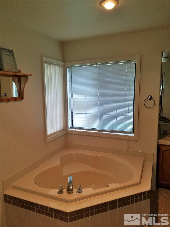 2580 Rice Road Fallon, NV 89406 - Photo 16 of 25 a bath tub sitting next to a window
