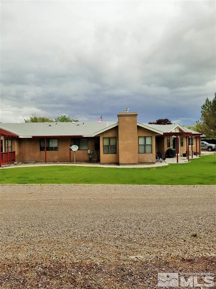 2580 Rice Road Fallon, NV 89406 - Photo 4 of 25 a front view of house with yard and green space