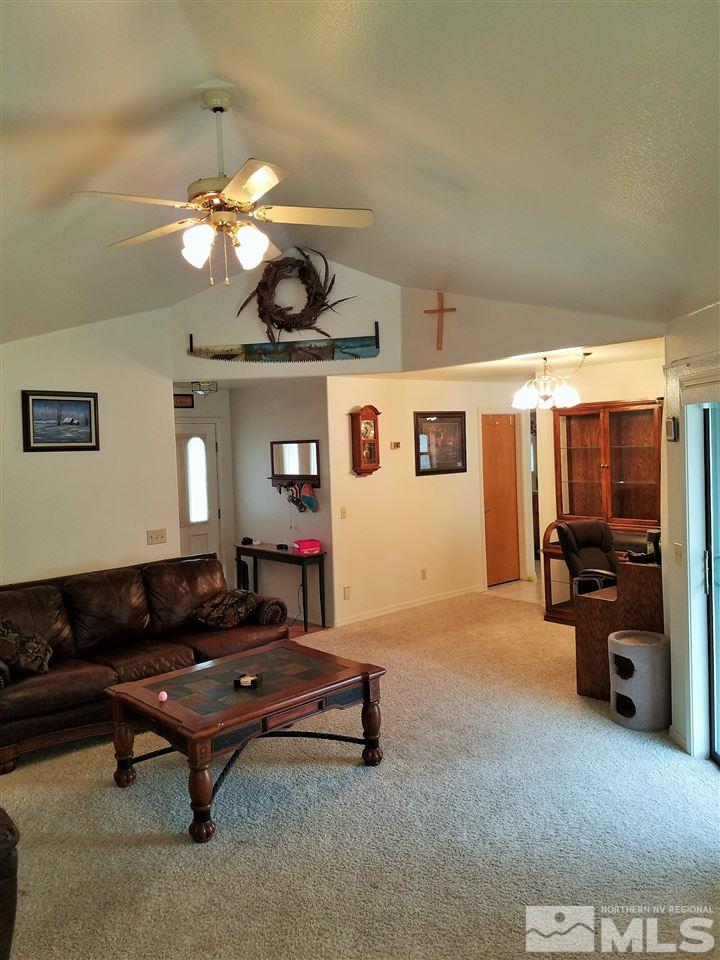2580 Rice Road Fallon, NV 89406 - Photo 8 of 25 a living room with furniture and a flat screen tv
