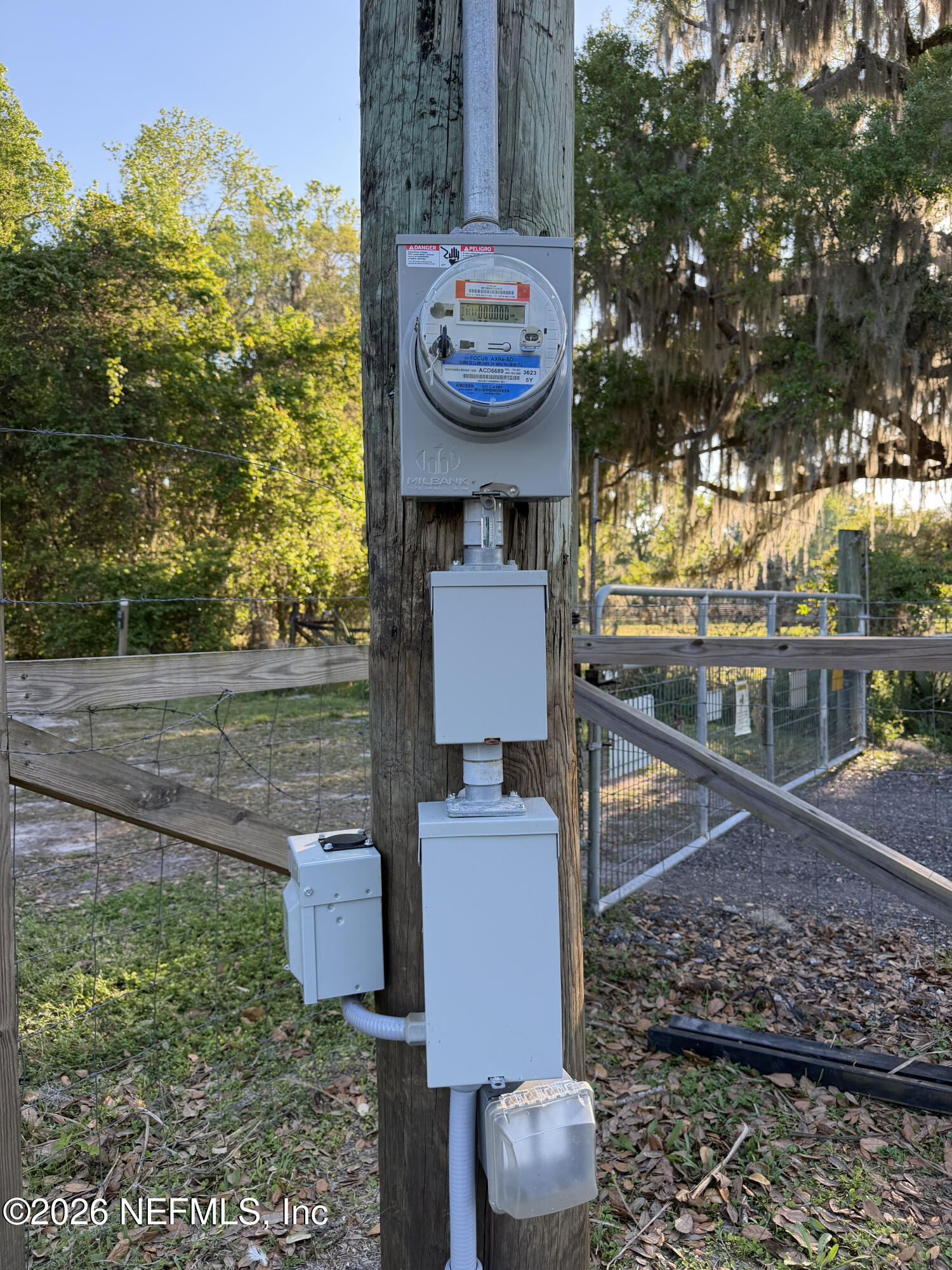 1133 Turnbull Grove Road Oak Hill, FL 32759 - Photo 14 of 14 a view of a bench in front of a yard