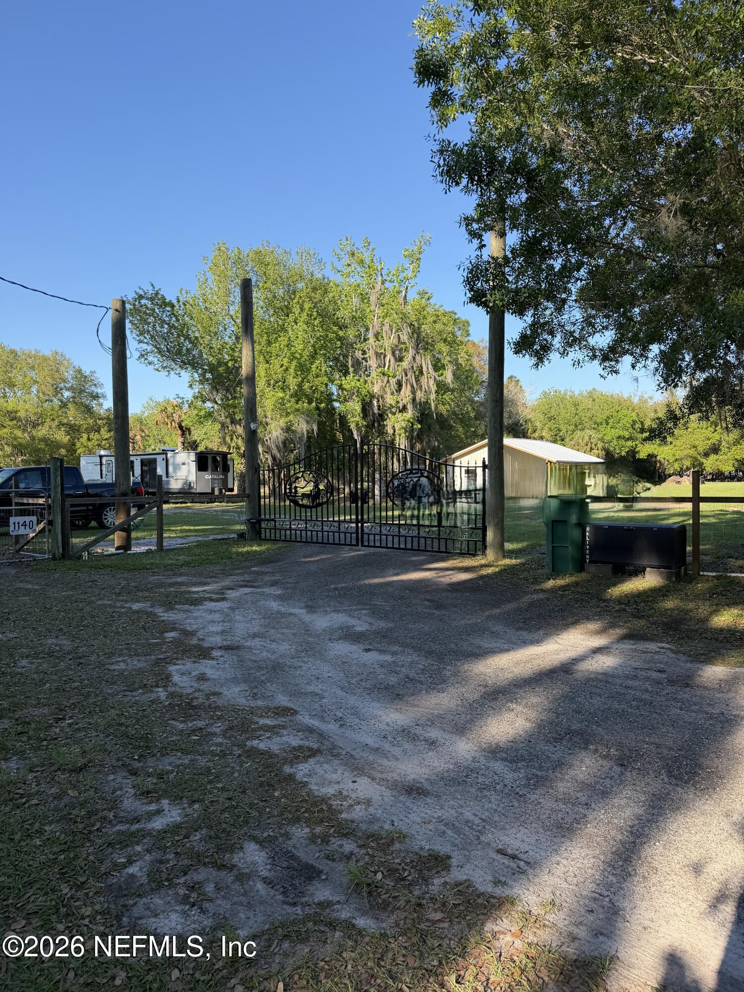 1133 Turnbull Grove Road Oak Hill, FL 32759 - Photo 2 of 14 a view of street with outdoor space