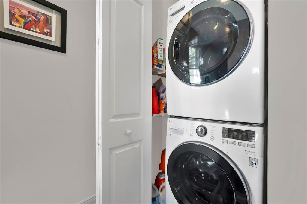 142 Morning Dew Circle, Unit 142 Jupiter, FL 33458 - Photo 26 of 34 a utility room with dryer and washer