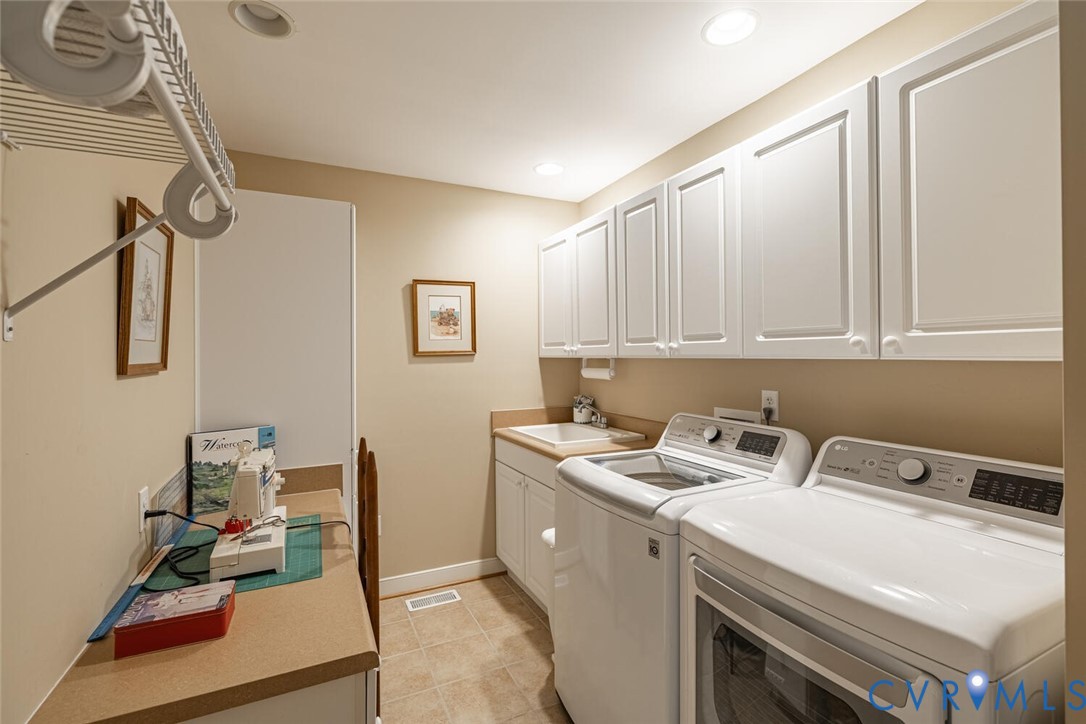 959 Manakin Road Midlothian, VA 23113 - Photo 24 of 50 Great laundry room with storage, work area and sin