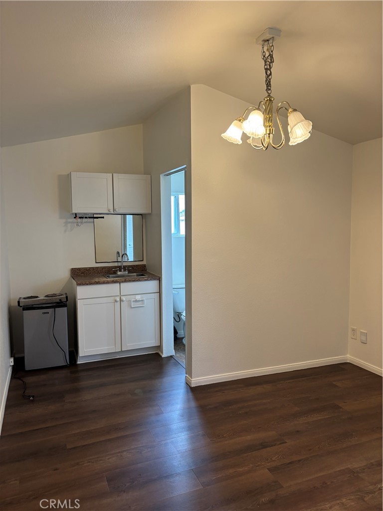 24627 B Moon Avenue Lomita, CA 90717 - Photo 5 of 7 a view of kitchen with stove refrigerator and microwave