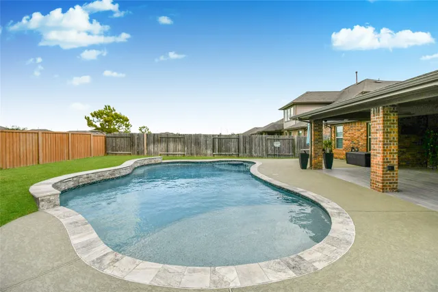 a view of outdoor space yard deck patio and fire pit