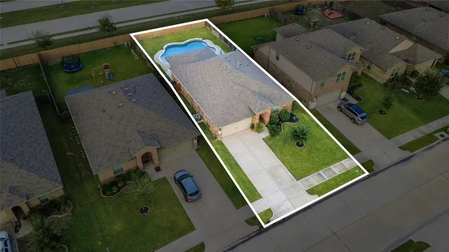 an aerial view of a backyard