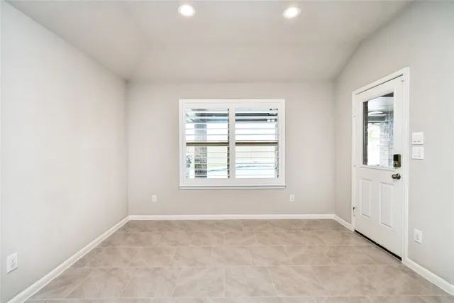 an empty room with windows