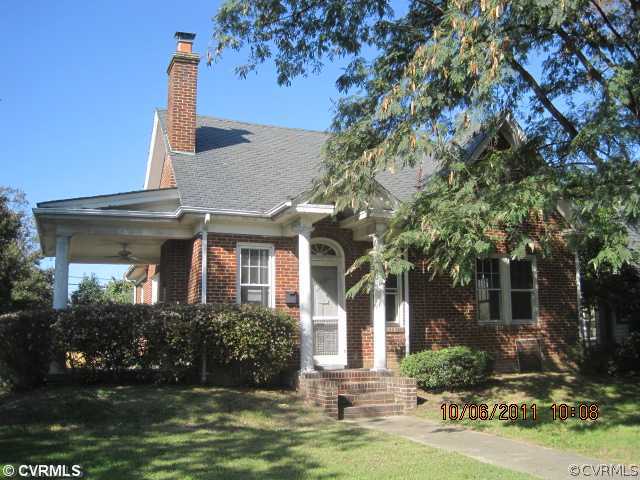 4600 Brook Road Richmond, VA 23227 - Photo 1 of 12 front view of a house with a tree