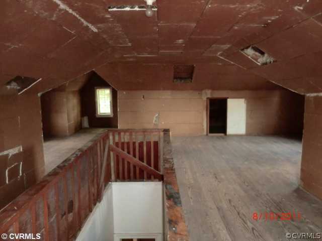 4600 Brook Road Richmond, VA 23227 - Photo 11 of 12 a view of entryway and hall with wooden floor