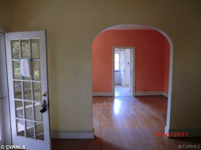 4600 Brook Road Richmond, VA 23227 - Photo 5 of 12 a view of a livingroom with wooden floor and a bathroom