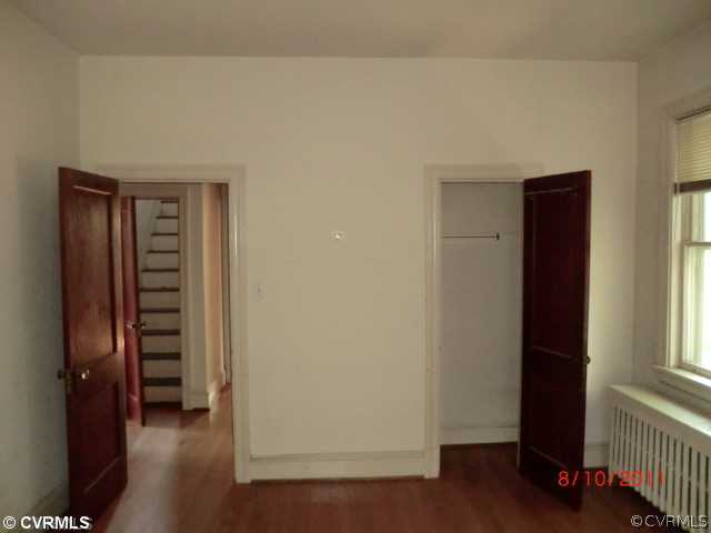 4600 Brook Road Richmond, VA 23227 - Photo 9 of 12 a view of an empty room with wooden floor and closet