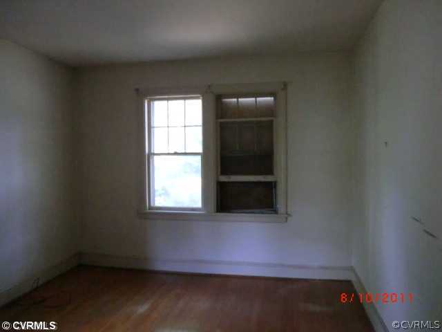4600 Brook Road Richmond, VA 23227 - Photo 10 of 12 an empty room with wooden floor and windows