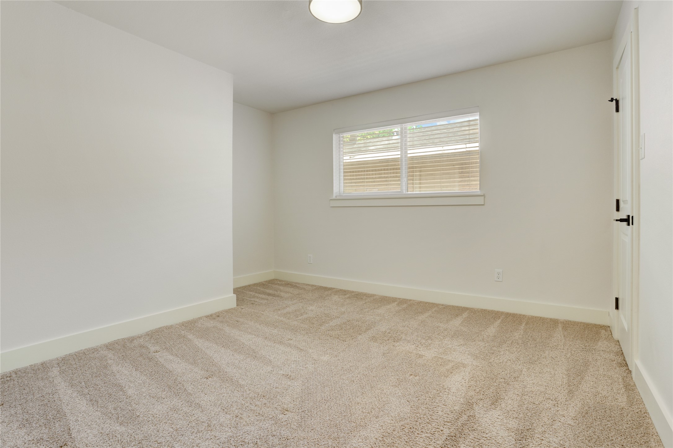 5514 Indigo Street Houston, TX 77096 - Photo 16 of 22 an empty room with a window