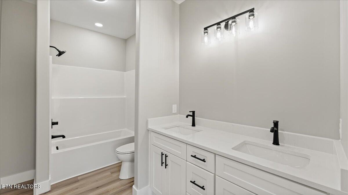 5817 Caldwell Road Loudon, TN 37774 - Photo 21 of 43 a bathroom with a sink a toilet and shower