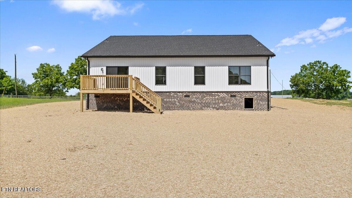 5817 Caldwell Road Loudon, TN 37774 - Photo 36 of 43 front view of a house with a yard