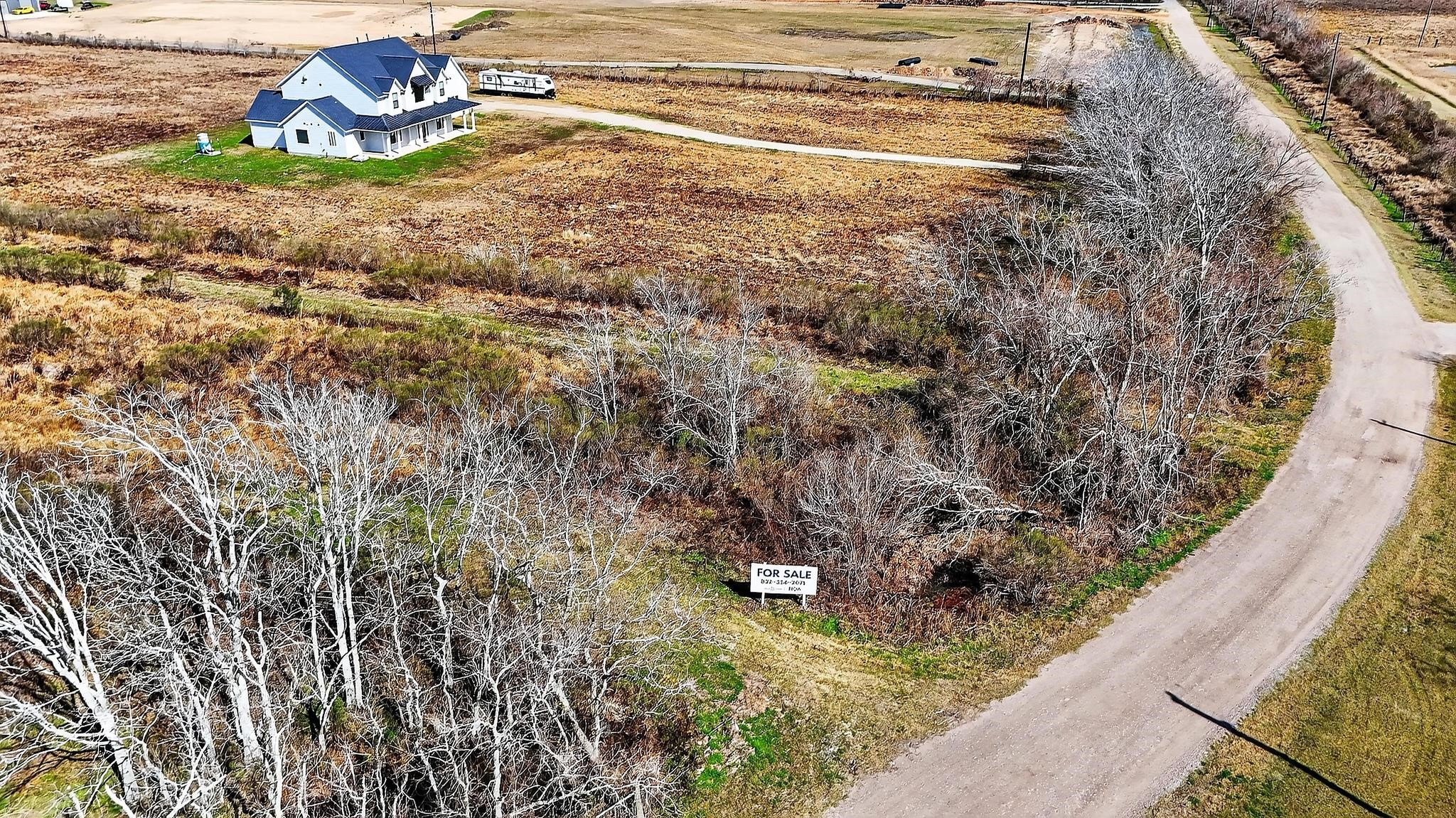 49 County Road 49 Angleton, TX 77515 - Photo 15 of 20 a view of a swimming pool with a yard