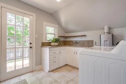 a workspace with furniture and window