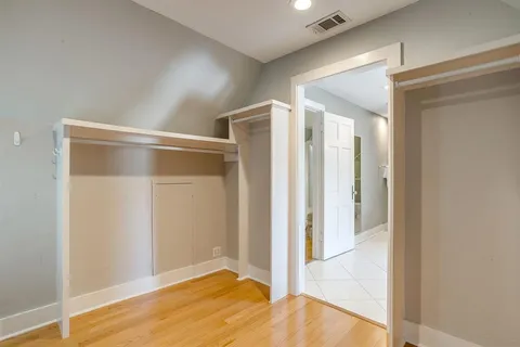 a balcony with wooden floor