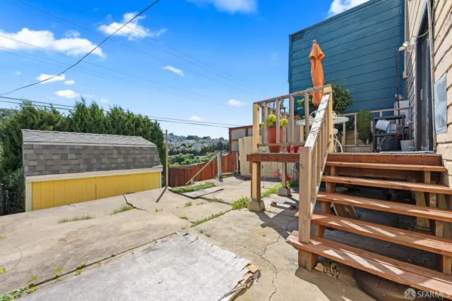 a view of a swimming pool with a lounge chairs