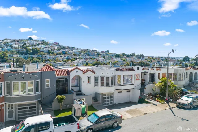 a view of a chairs and table in a patio