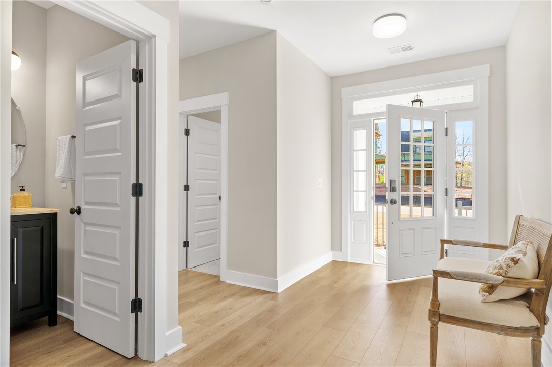 3401 Split Oak Circle Seneca, SC 29678 - Photo 2 of 8 Enter into a bright space with elegant flooring and a welcoming entryway.