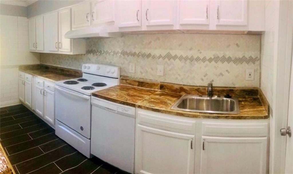 3190 Nectarine Circle Decatur, GA 30034 - Photo 5 of 6 a kitchen with sink and cabinets