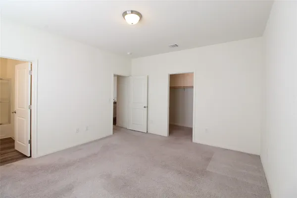 an empty room with an entryway