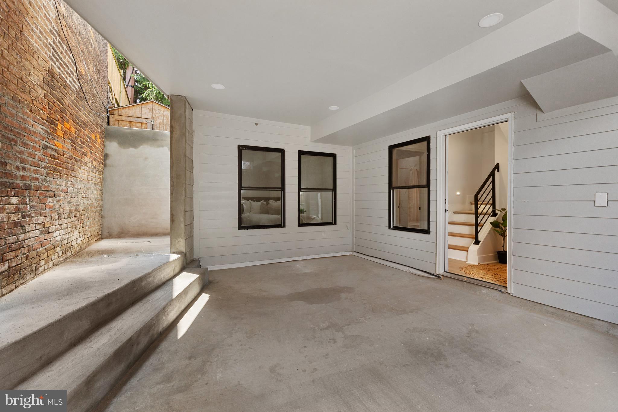 1601 Portugal Street Baltimore, MD 21231 - Photo 44 of 45 a view of a livingroom with a staircase