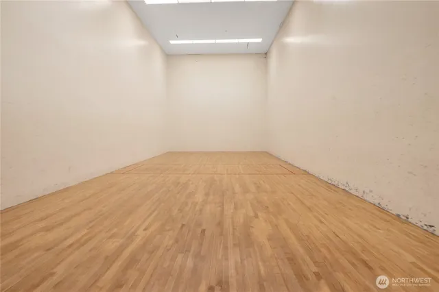 a view of work space with racks on the wall