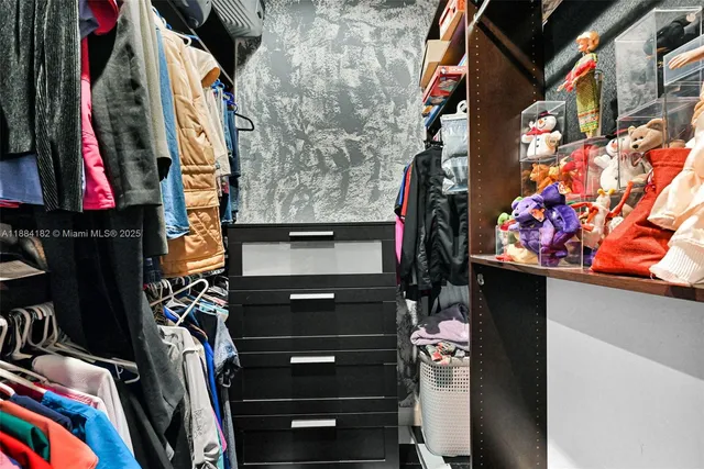 a view of a bedroom from a hallway